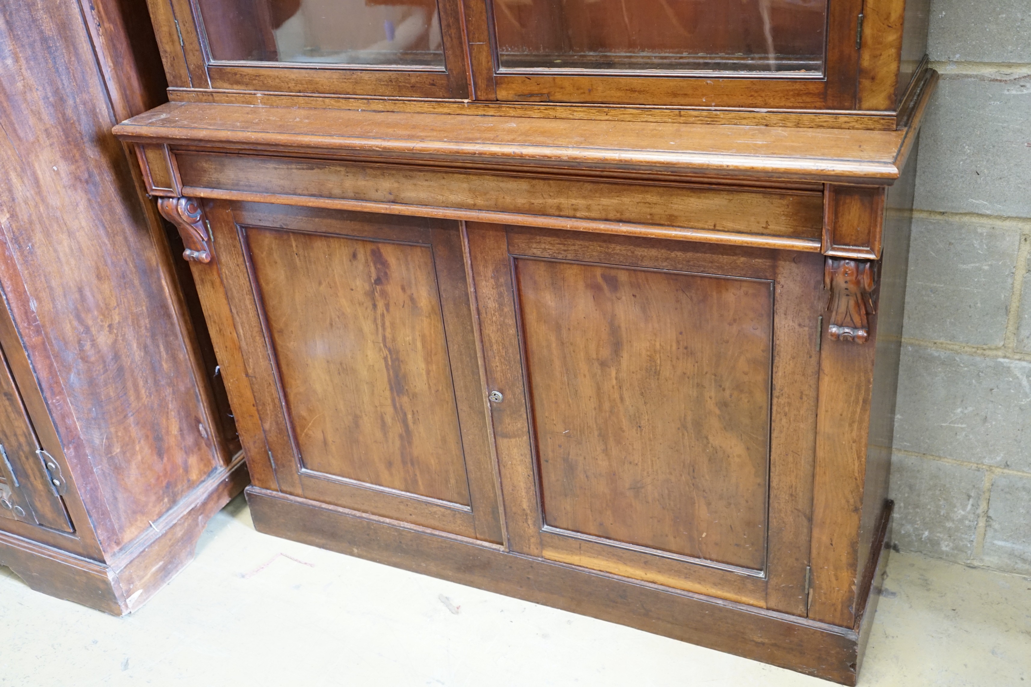 A late Victorian mahogany bookcase, length 122cm, depth 41cm, height 218cm